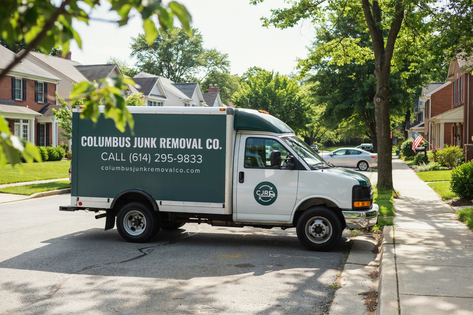 Columbus Junk Removal Co. truck on a residential street